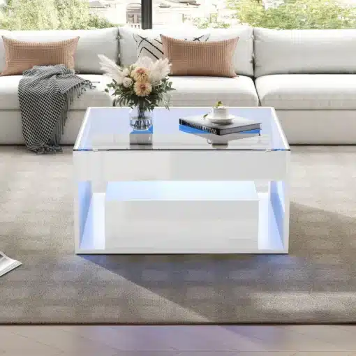 Kaasaegne valge diivanilaud LED-valgustusega ja kahe sahtliga, mille klaaspind peegeldab elegantselt elutoa sisustust, luues hubase atmosfääri.