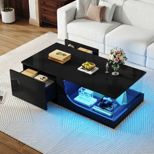 Diivanilaud LED-valgustusega, must, 2 sahtlit, MDF klaas | E-pood Tootemaailm Must diivanilaud LED-valgustusega, mille klaasist pind ja MDF materjaliga korpus on elegantselt paigutatud heledal vaibal heledas elutoas. Laud sisaldab kahte sahtlit ja sinise tooniga valgustust, mis täiendavad moodsa disaini esteetikat.