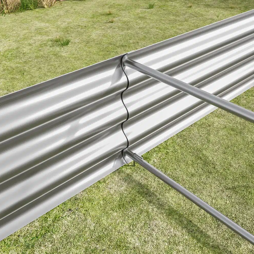 Tsingitud terasest kõrge peenrakast avatud põhjaga 8x3x1 ft paigutatud rohelisele murule, rõhutades vastupidavat materjali ja praktikust disaini aianduse jaoks.