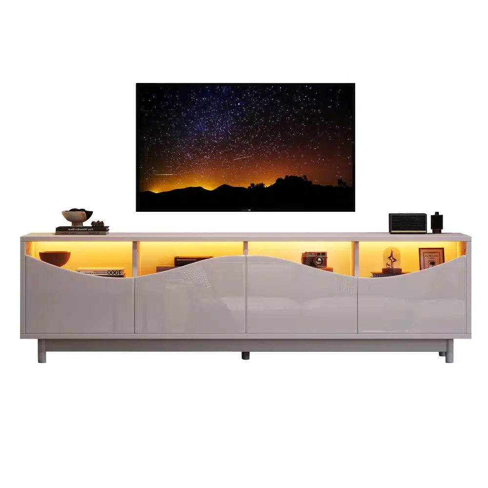 Valge kõrgläikega TV-alus, 175 cm, koos LED-valgustusega; esiplaanil on minimalistlik disain, mille sisseehitatud valgustus esile tõstab aluse siledad pinnad ja kaasaegse stiili.