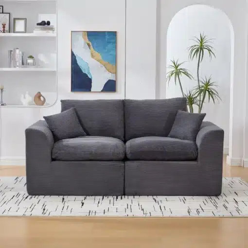 Kahekohaline mooduldiivan - 2 tugitooli | E-pood Tootemaailm Kahekohaline mooduldiivan - 2 tugitooli, tumehallist pehmest kangast, modernse ja minimalistliku disainiga elutoas, taustal valged seinad ja kunsttaimed.