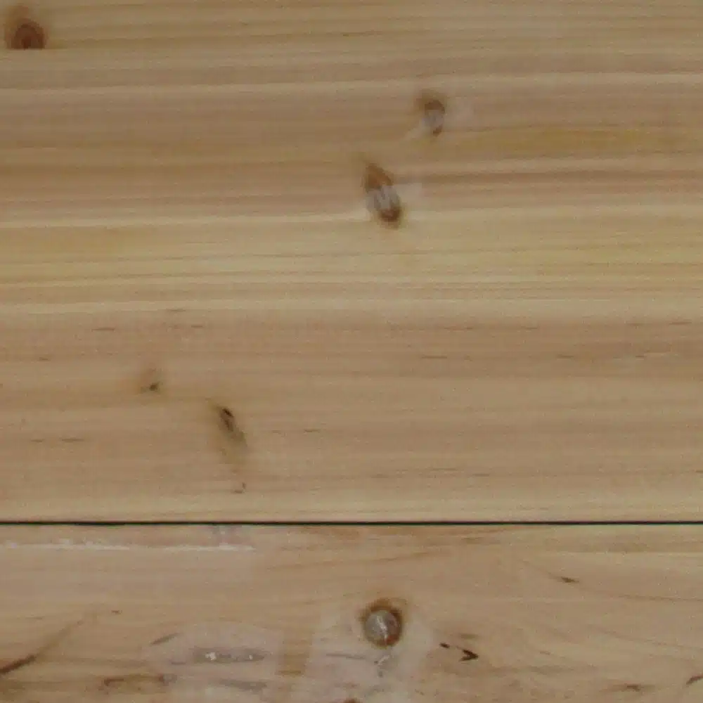 Puidust tekstuur kõrgendatud aiapeenra polükarbonaatkattega 120x54x122 cm küljel, naturaalsete puusüüde ja soojade toonidega.