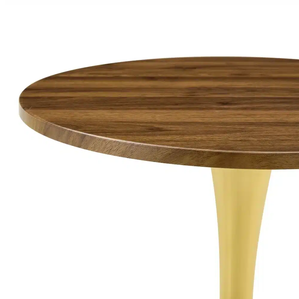 Ümmargune diivanilaud 60 cm, pähklipuu MDF, kuldne jalg, mis tõstab esile oma elegantse disaini ja kvaliteetse viimistluse. Lauda ümbritseb soe ja loomulik pähklipuu toon, mis harmoneerub luksusliku kuldse jalaga.