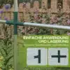 Putukavõrk aiataimedele uksega, HDPE, 1.2x3.6 m | E-pood Tootemaailm Lähedalt vaade HDPE putukavõrgule aiataimedele, rõhutades tugevat ja lihtsasti paigaldatavat ühendusstruktuuri rohelise ja halli värviga. Taustal on näha lillerohket aeda, mille ees on puidust tara.