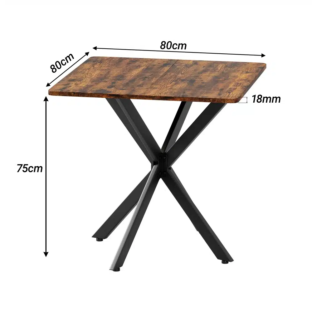 Ümmargune söögilaud 120 cm vintagepruun mustade metalljalgadega, näitab modernset ristuvate jalgade disaini, asetseb hele taustal.