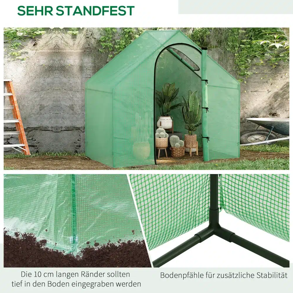 Roheline kasvuhoone aknaga, valmistatud PVC katte ja terasraamiga mõõtudega 180x100x168 cm, asub aias vastu kivimüüri, täiendatud taimedega seespool.