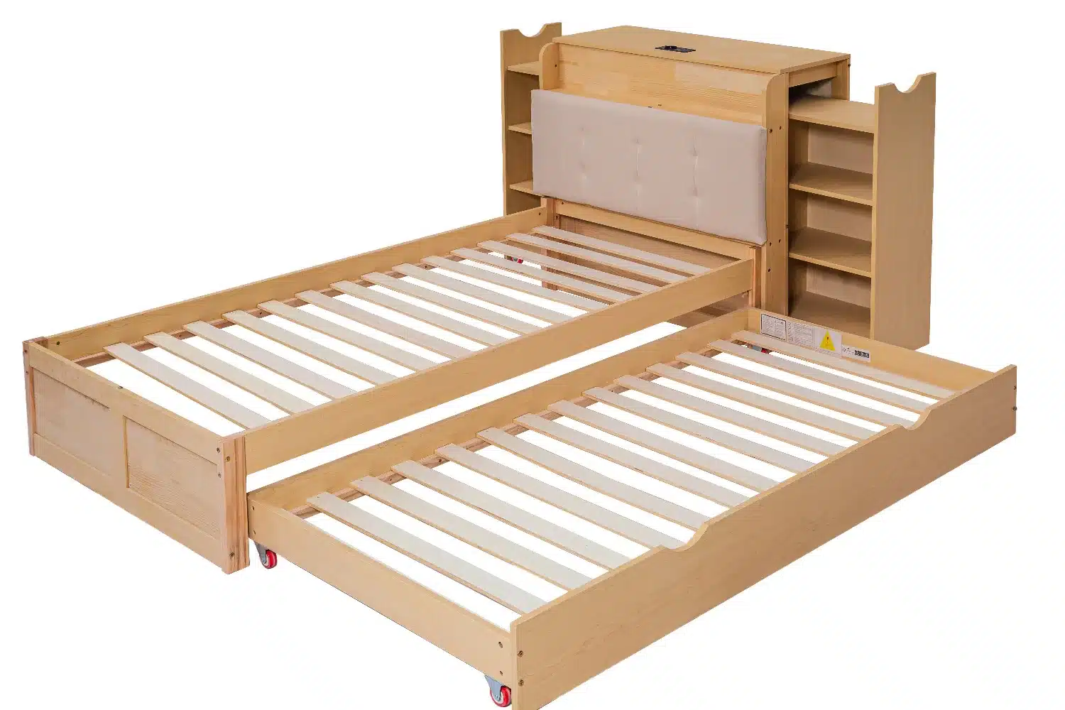 Multifunktsionaalne voodi panipaigaga, mõõtudega 90x200 cm. Voodi on valmistatud heledast puidust, millel on praktiline väljatõmmatav lisaosa. Taustal on nähtav kapp koos riiulitega, mis pakub lisaruumi hoiustamiseks.