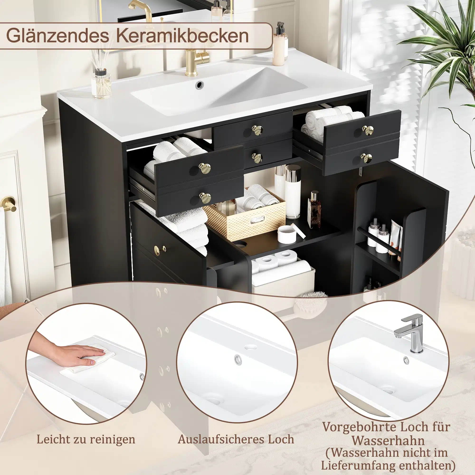 Vannitoakapp keraamilise valamuga must-kuld; avatud, et näidata sahtleid ja riiuleid rätikutega. Valamu peal kuldne segisti, taustal hele sein ja roheline taim. Must kapp pakub elegantset kontrasti heleda keraamilise valamuga.
