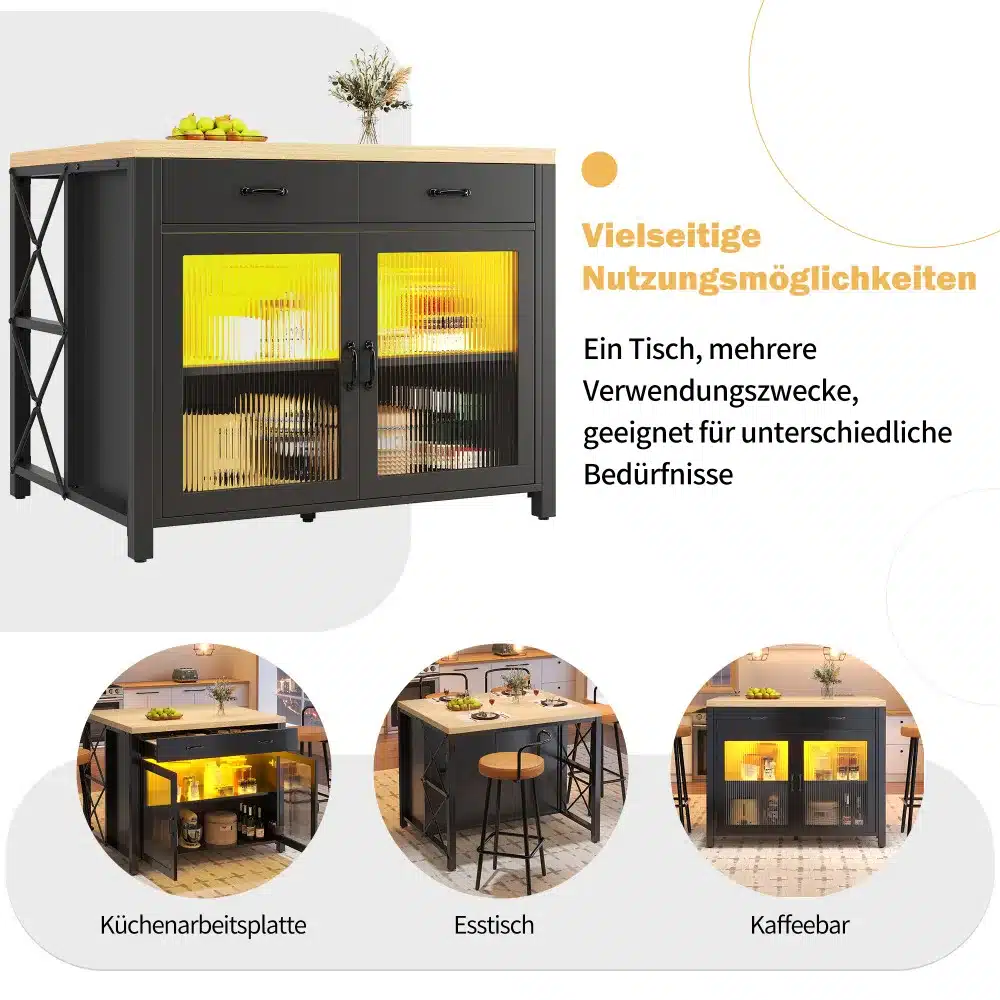 Köögilaud kapi, LED-valgusega, puidu imitatsioon, musta raamiga ja heleda puidu pinnaga, kahe klaasist ustega ja LED-taustvalgustusega. Laud on paigutatud heledale põrandale ja selle peal on dekooresemed ning puuviljad.
