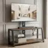 Telerialus puidust, musta klaasiga, reguleeritav kõrgus | E-pood Tootemaailm Elegantne puidust telerialus musta klaasiga, mille kõrgust on võimalik reguleerida. Telerialus on paigutatud heledas elutoas ja sellel on moodne televiisor. Alusel on kaks klaasriiulit ja üks puidust riiul, kirjanduse ja dekoratiivsete esemete hoidmiseks.