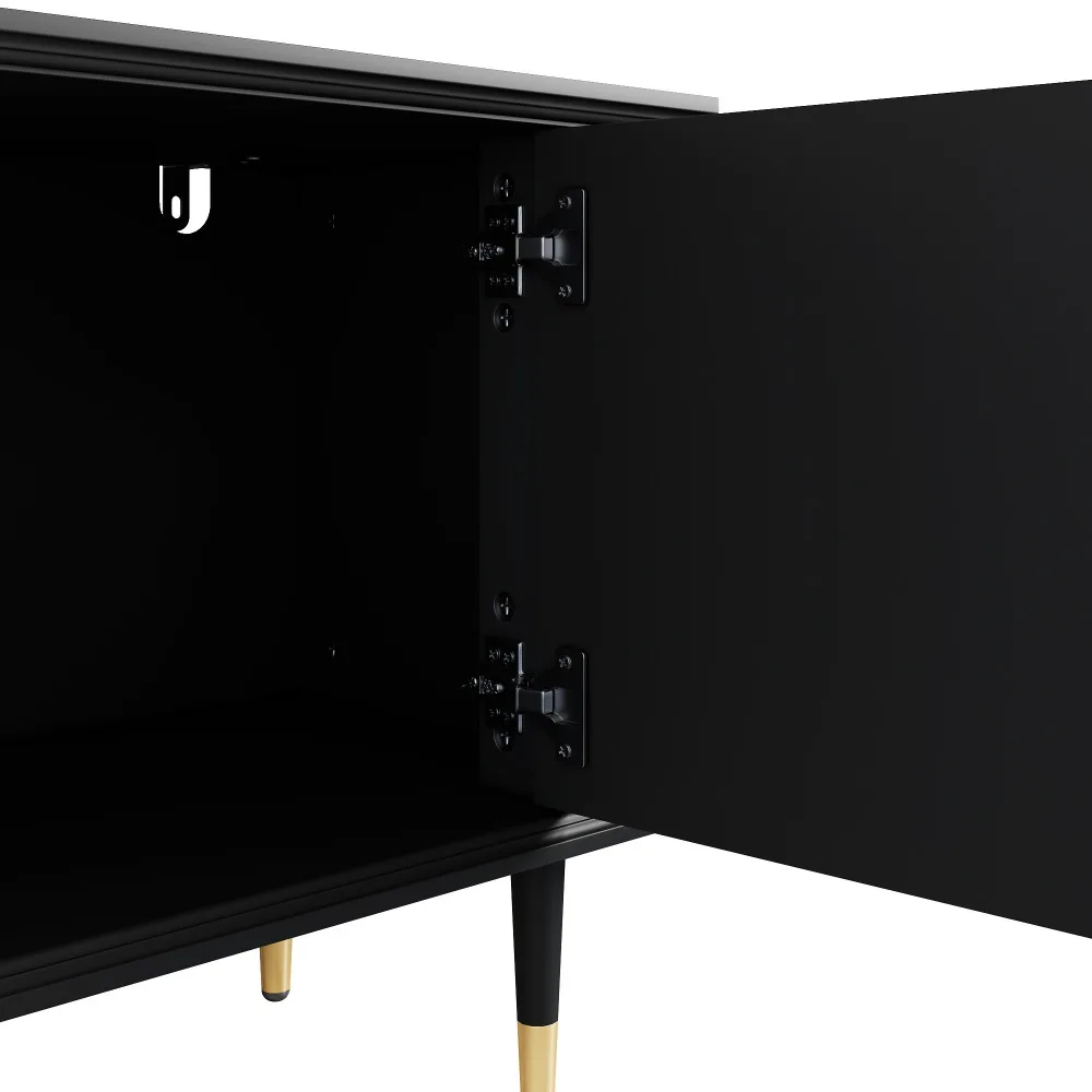 TV-alus avatud riiulite ja sahtlitega, lakitud viimistlus. Musta värvi kapp avatud uksega, mis paljastab sisu ja elegantseid kullaga viimistletud jalgu. Minimalistlik ja kaasaegne disain sobib igasse elutuppa.