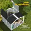Koerakuut terrassiga, ilmastikukindel puit, hall, keskmine | E-pood Tootemaailm Koer lamab hallil keskmise suurusega puidust koerakuudis, millel on terrass ja ilmastikukindel katus, asub rohelise muru keskel.