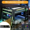 Narivoodi kirjutuslaua ja USB- ning LED-valgustusega 140x200 | E-pood Tootemaailm Tume puit narivoodi integreeritud kirjutuslaua, USB laadimispunktide ja LED-valgustusega. Voodi on paigutatud modernsesse tuppa, kus valgusriba ja elektroonilised seadmed lisavad tehnoloogilist hõngu.
