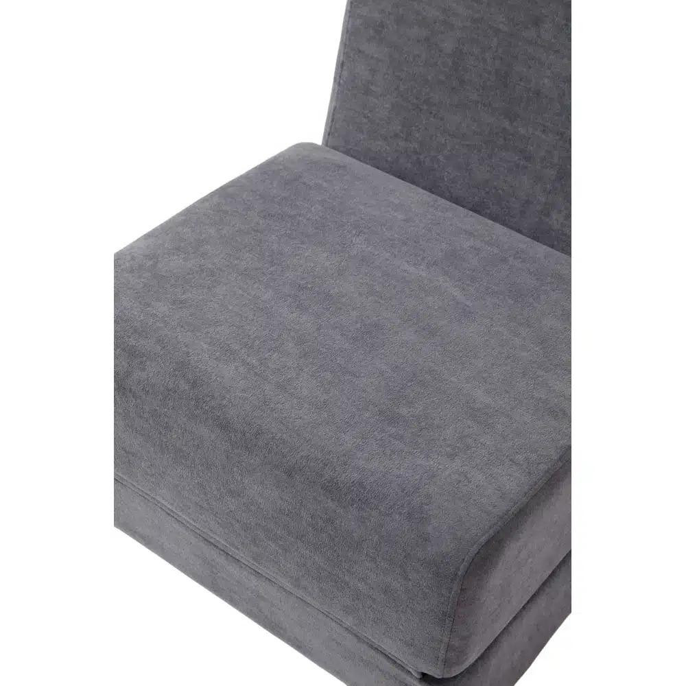 Close-up of a grey-colored, foldable and multifunctional mattress on a sofa bed, featuring a smooth fabric texture that complements the living room design.