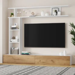 Modernne Tv-alus seinariiulitega, mõõtmetega 180x35x22,5 cm, millel on puitimitatsioonist alumised kapid ja valged riiulid, taustal hele sein ja esiplaanil vaasitega kaunistatud riiulid.