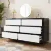 Kummut 6 sahtliga modernne disain 140×38×74,5 cm | E-pood Tootemaailm Mustvalge kummut kuue sahtliga elutoas, ümmarguse peegli ja dekoratsioonidega