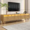 Tv-alus 178 cm minimalistliku disaini ja nelja suure sahtliga | E-pood Tootemaailm Puidust TV-kapp ribimustriga esipaneelide, kuldsete jalgade ja sisseehitatud valgusega