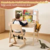 Reguleeritava kõrgusega laste kirjutuslaud | E-pood Tootemaailm Puidust multifunktsionaalne laste laud ja tool, laps istub kirjutuslaua taga