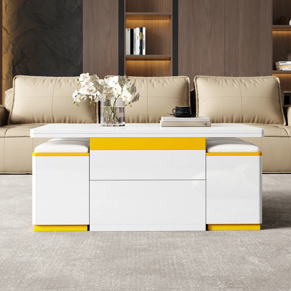 Valge ja kollaste detailidega modernne diivanilaud elutoas beige diivani ees
