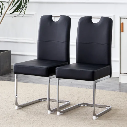 Ergonoomilised söögitoolid paksu polstriga 2 tk | E-pood Tootemaailm Kaks musta polsterdatud söögitooli metallraamiga modernses interjööris