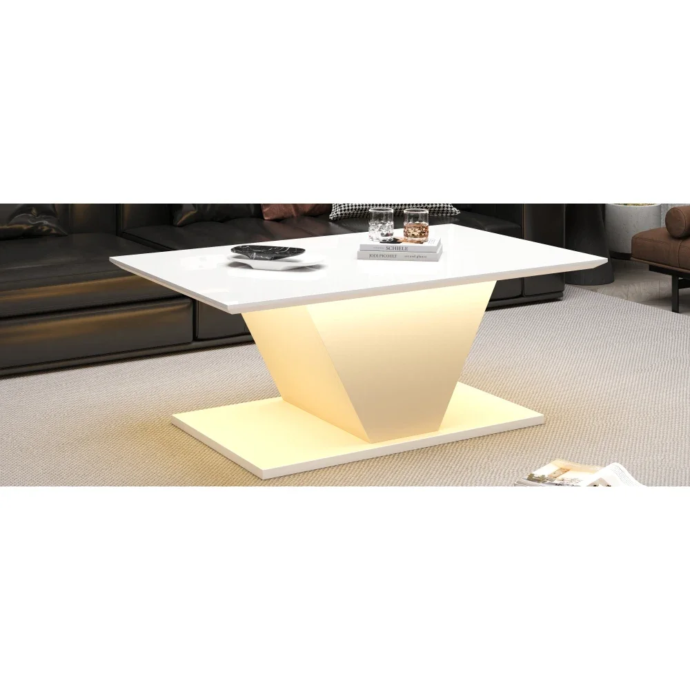Valge LED-valgustusega diivanilaud moodsas elutoas