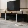 Moodsad TV-alused LED-valguse ja panipaikadega | E-pood Tootemaailm Must must mööbliese telerialuse ja dekoratsioonidega modernses interjööris