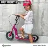 Laste tõukeratas reguleeritava lenksu ja õhkrehvidega | E-pood Tootemaailm Tüdruk sõidab roosa HyperMotion Ruby Cherry tõukerattaga, kiiver peas