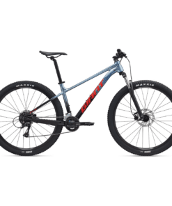Giant hardtail maastikuratas sinakashalli raamiga, punase logoga, suurte Maxxis rehvide ja esiamordiga