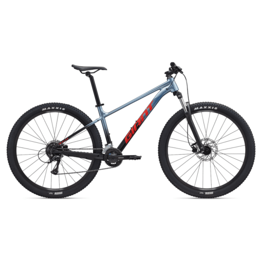 Giant hardtail maastikuratas sinakashalli raamiga, punase logoga, suurte Maxxis rehvide ja esiamordiga