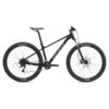 Must hardtail-mägijalgratas musta raamiga ja suurte rehvidega külgvaates
