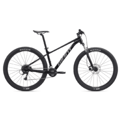 Must hardtail-mägijalgratas musta raamiga ja suurte rehvidega külgvaates