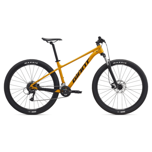 Kollane Giant hardtail maastikuratas mustade rehvide ja esiamordiga, külgvaade valgel taustal