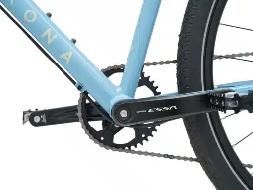 Meeste jalgratas Kona Dew | E-pood Tootemaailm Sinise jalgratta Shimano ESSA vänt ja kett tagaratta lähedal