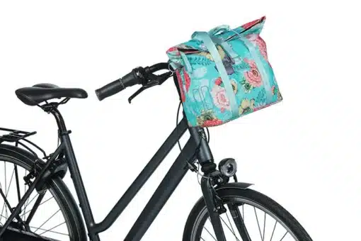 Jalgratta lenksukott Basil Bloom Field veekindel | E-pood Tootemaailm Ratta juhtraual värviline lillemustriga pakikott mustal jalgrattal