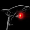 Jalgratta tagatuli Giant Recon TL 100 | E-pood Tootemaailm Jalgratta sadula all olev punane tagatuli mustal taustal