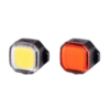 Jalgrattatulede komplekt Giant Cast 30 USB-laetav | E-pood Tootemaailm Kaks väikest nelinurkset LED-tuld musta korpusega, üks kollase ja teine oranži läätsaga