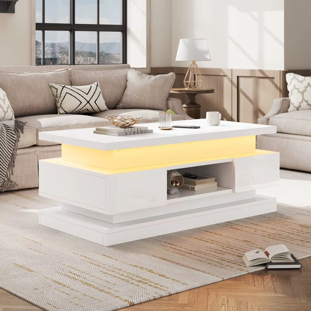 Valge modernne LED-valgustusega kohvilaud elutoas, avatud riiuliga ja panipaigaga