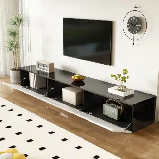 TV-alus 16 värvi LED-valgustusega, 180 cm | E-pood Tootemaailm Mustast läikivast viimistlusega madal TV-kapp seinal rippuva televiisori all, avatud riiulitega.
