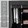 Kokkupandav must riidekapp riiulite, sahtlite ja riputustorudega | E-pood Tootemaailm Must riidest riidekapp rippuvate riiete ja kokkupandud pesuga