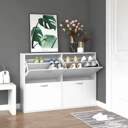 Jalatsikapp 4 klappuksega 120 × 24 × 81 cm | E-pood Tootemaailm Valge jalanõukapp kahe kallutatava sahtli ja alumiste ustega, jalatsid sees ning dekoratsioonid peal
