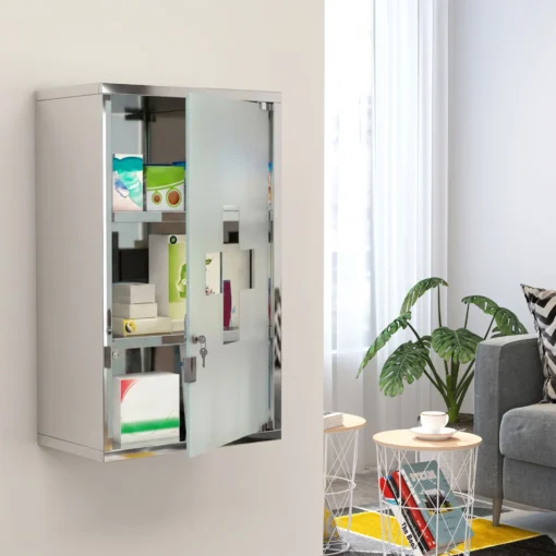 Lukustatav seinale kinnitatav ravimikapp esmaabitarvete hoiustamiseks | E-pood Tootemaailm Seinale paigaldatud lukustatav roostevabast terasest peegliga kapp avatud ukse ja riiulitega