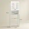 WC-kohale paigaldatav vannitoakapp ribustega ustega | E-pood Tootemaailm Valge kahe uksega pesumasinakapp mõõtudega 67 × 31,5 × 190 cm ja avatud riiuliga