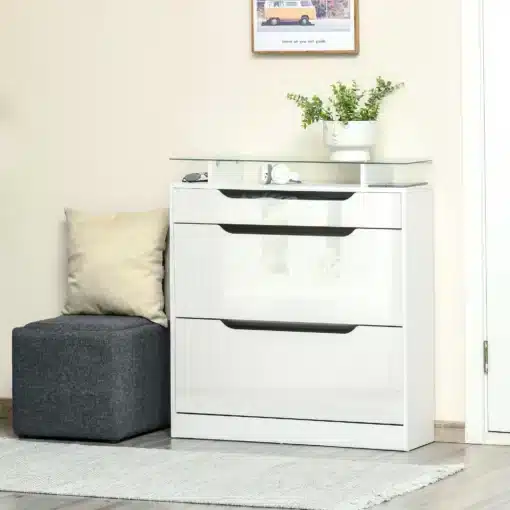 Jalatsikapp klappustega ja sahtliga 89 x 23 x 96 cm | E-pood Tootemaailm Valge läikiva viimistlusega kolme sahtliga kummut klaasplaadi ja taimega valgusküllases interjööris