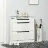 Jalatsikapp klappustega ja sahtliga 89 x 23 x 96 cm | E-pood Tootemaailm Valge kolme sahtliga jalanõudekapp klaasist pealispinna ja vihmavarjuhoidjaga esikus