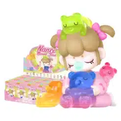 Nanci Sweet Time figuur roosades riietes, värviliste karukeste ja tootepakenditega