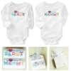 valged beebi bodid kirjaga 'my heart belongs to mommy' ja 'my heart belongs to daddy'
