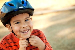 young boy with cycle helmet