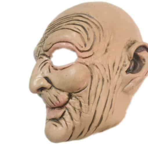 kortsuline vana mehe mask, millel on väljendusrikkad näojooned ja kiilas pea