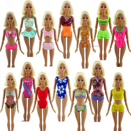 erinevates värvilistes rannariietes Barbie nukud