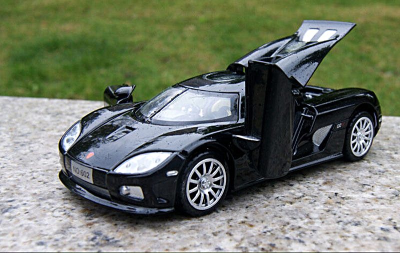 must elektriline mänguauto avatud uste ja detailse disainiga